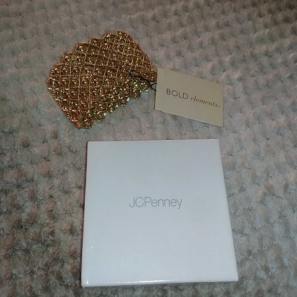 Bold elements gold bracelet
